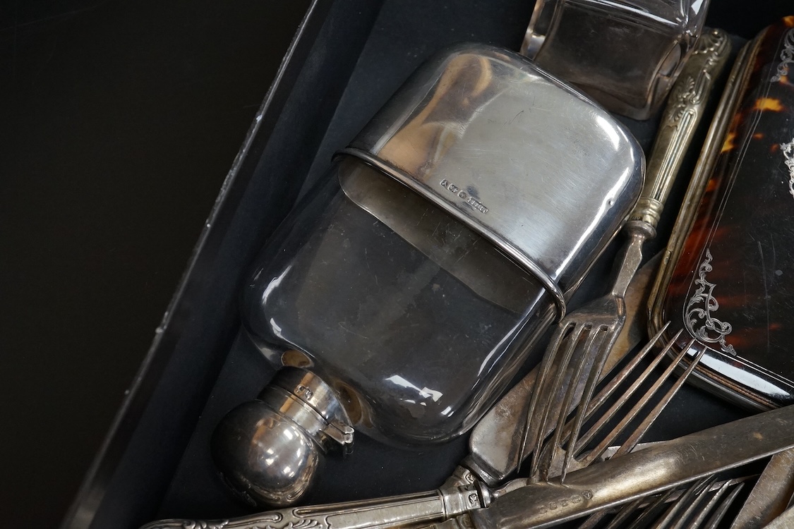A late Victorian silver mounted glass hip flask, James Dixon & Sons, Sheffield, 1891, 15.5cm (lead solder), together with a silver mounted glass inkwell, assorted silver handled plated dessert eaters(a.f.) and a tortoise